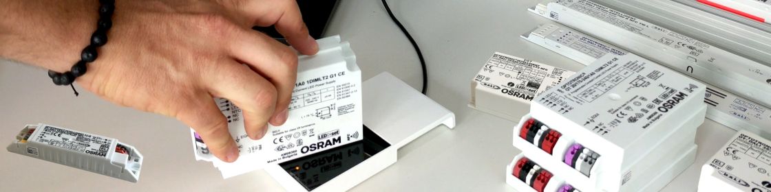 How can I reprogram an LED driver that is already integrated into a luminaire?